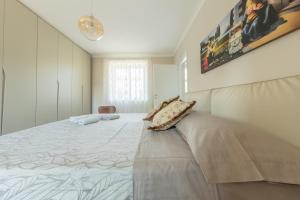 a bedroom with a large bed in a room at Villa ELENA in Mirabella Eclano