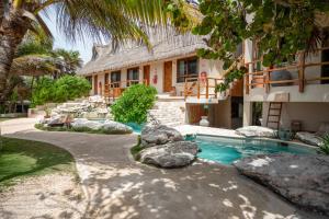 Бассейн в Mezzanine Tulum, a Small Luxury Hotel или поблизости