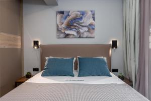 Posteľ alebo postele v izbe v ubytovaní De Bosset Suites Kefalonia
