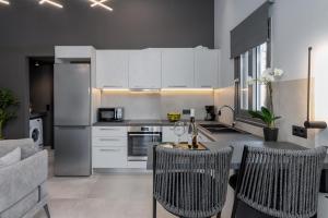 Kuchyňa alebo kuchynka v ubytovaní De Bosset Suites Kefalonia