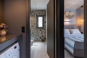 Posteľ alebo postele v izbe v ubytovaní De Bosset Suites Kefalonia