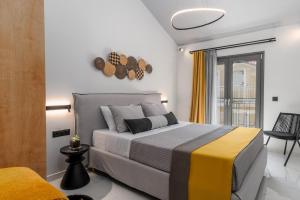 Posteľ alebo postele v izbe v ubytovaní De Bosset Suites Kefalonia