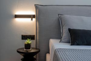 Posteľ alebo postele v izbe v ubytovaní De Bosset Suites Kefalonia