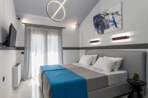 Posteľ alebo postele v izbe v ubytovaní De Bosset Suites Kefalonia