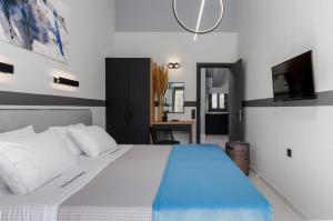 Posteľ alebo postele v izbe v ubytovaní De Bosset Suites Kefalonia