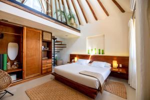 Кровать или кровати в номере Mezzanine Tulum, a Small Luxury Hotel