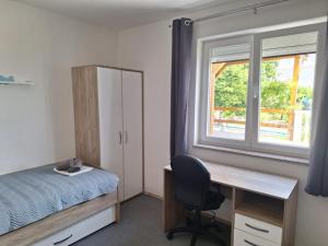 Ένα ή περισσότερα κρεβάτια σε δωμάτιο στο Apartman Nam 6