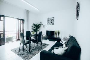 TV a/nebo společenská místnost v ubytování Flor do Mar