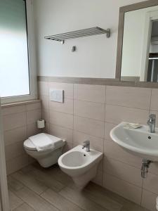 Koupelna v ubytování Hotel Katina