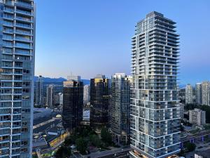 a view of a city with tall buildings at Monthly stay-Relocation Special-New condo at Metrotown in Burnaby