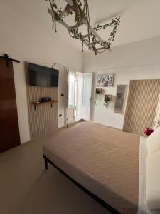 Postel nebo postele na pokoji v ubytování B&B Antiche Mura + 37 fotografií