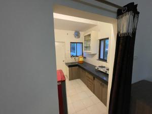 Kuchyň nebo kuchyňský kout v ubytování Samruddhi S1 homestay garden villa or S3