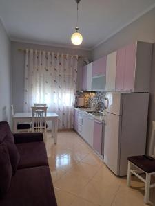 Kuchyň nebo kuchyňský kout v ubytování Bello Apartaments
