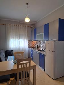 Kuchyň nebo kuchyňský kout v ubytování Bello Apartaments