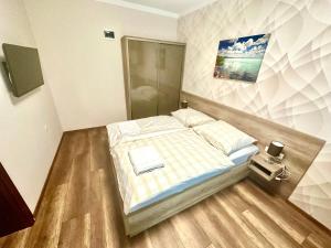 Posteľ alebo postele v izbe v ubytovaní See Vendégház - Siófok