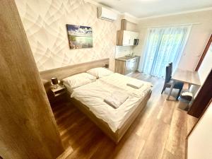 Posteľ alebo postele v izbe v ubytovaní See Vendégház - Siófok