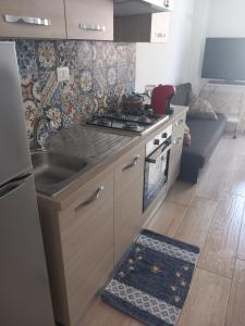 Kuchyňa alebo kuchynka v ubytovaní Casa Stefy + 4 fotografie