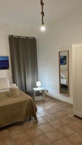 Postel nebo postele na pokoji v ubytování Domus Mea Apartments