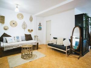 Postel nebo postele na pokoji v ubytování Malaya House