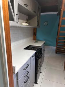 Η κουζίνα ή μικρή κουζίνα στο 4Kingston close Umhlanga ridge +9 φωτογραφίες