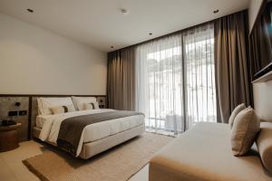 Postel nebo postele na pokoji v ubytování Radream Hotels & Spa + 37 fotografií