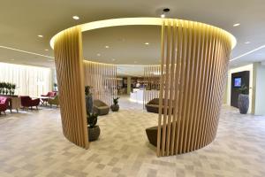 Lobby o reception area sa Novotel Paris Nord Expo Aulnay