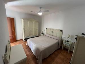 Postel nebo postele na pokoji v ubytování Apartamentos Turisticos Paraíso Andaluz + 15 fotografií