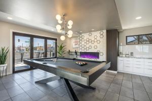 a billiard room with a pool table at Walkable Wonder Midtown Studio near Downtown Gems in Reno