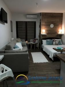 Postel nebo postele na pokoji v ubytování Ferias Apartmani