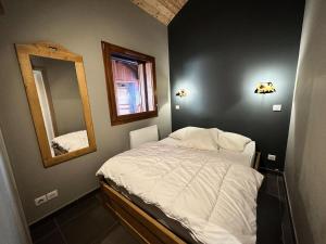 Postel nebo postele na pokoji v ubytování Résidence Les Terrasses De Vars Ste Marie - LES TERRASSES DE VARS SAINTE MARIE MAE-9941