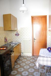Kuchyň nebo kuchyňský kout v ubytování Maison Raffaello + 4 fotografie