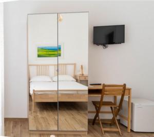 TV a/nebo společenská místnost v ubytování La Cicala del Conero + 14 fotografií