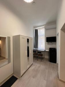 Postel nebo postele na pokoji v ubytování MaNo Studios Budapest I