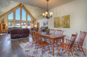 a dining room with a table and chairs at MountainAire in South Fork, CO in South Fork