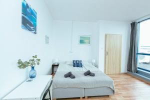 Postel nebo postele na pokoji v ubytování Hostel Metro Kabaty