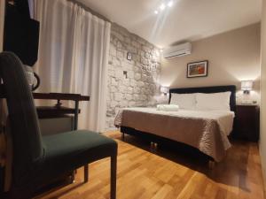 Postel nebo postele na pokoji v ubytování Carol Rooms