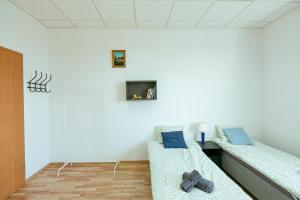 Postel nebo postele na pokoji v ubytování Hostel Metro Kabaty