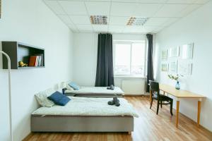 Postel nebo postele na pokoji v ubytování Hostel Metro Kabaty