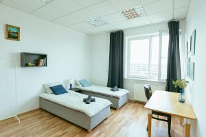 Postel nebo postele na pokoji v ubytování Hostel Metro Kabaty
