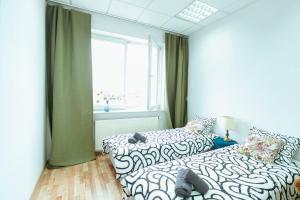 Postel nebo postele na pokoji v ubytování Hostel Metro Kabaty