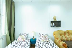 Postel nebo postele na pokoji v ubytování Hostel Metro Kabaty