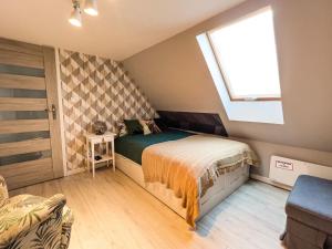 Ένα ή περισσότερα κρεβάτια σε δωμάτιο στο Holiday Home in Choczewo near Baltic Sea +16 φωτογραφίες