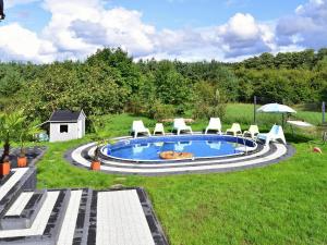 Πισίνα στο ή κοντά στο Holiday Home in Choczewo near Baltic Sea