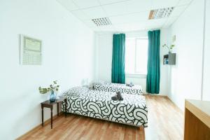 Postel nebo postele na pokoji v ubytování Hostel Metro Kabaty