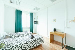 Postel nebo postele na pokoji v ubytování Hostel Metro Kabaty
