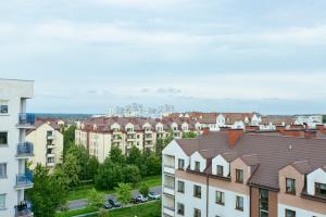 Nespecifikovaný výhled na destinaci Varšava nebo výhled na město při pohledu z hostelu