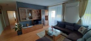 Χώρος καθιστικού στο Apartman Sandy Prestige