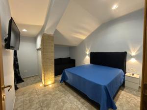 Postel nebo postele na pokoji v ubytování Domus Arco Romano + 37 fotografií