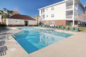 The swimming pool at or close to Coastal Calm Retreat