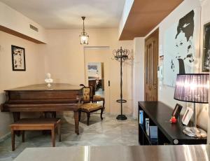 Posezení v ubytování 4 Squares Apartments - Piano Studio